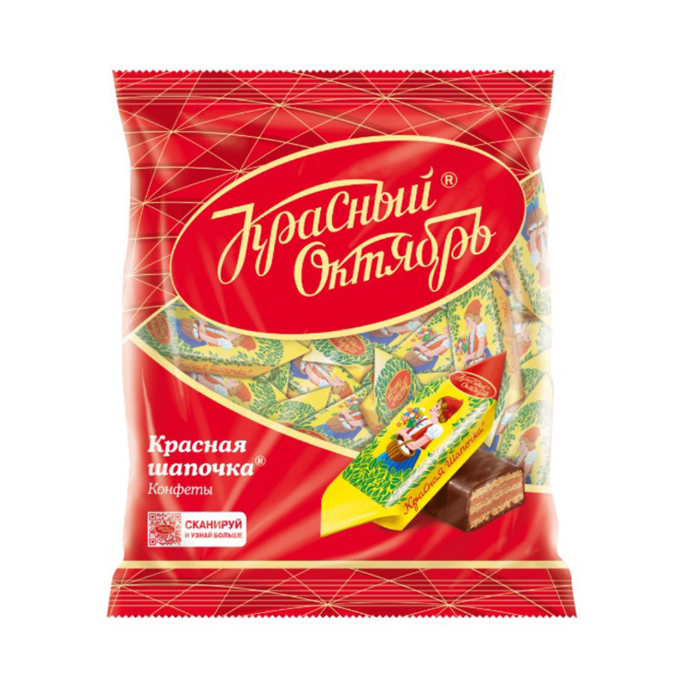 Chocolate candies "Little Red Riding Hood" Red October. Delicate praline with vanilla aroma with the addition of grated peanuts between layers of wafers. 250g